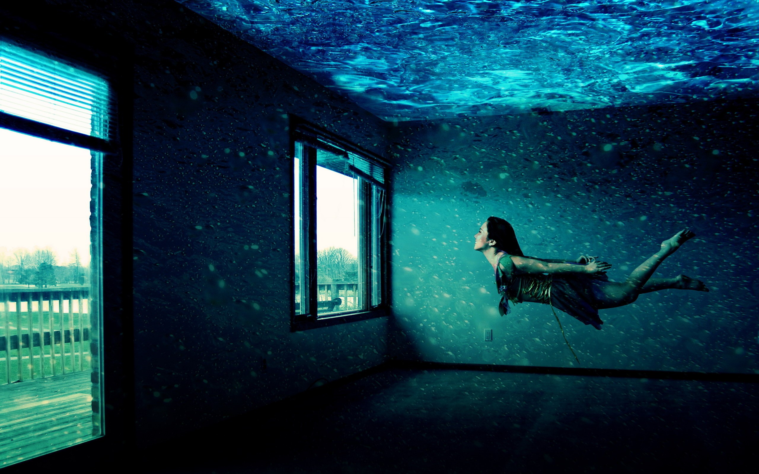 Girl swimming in underwater room wallpaper download